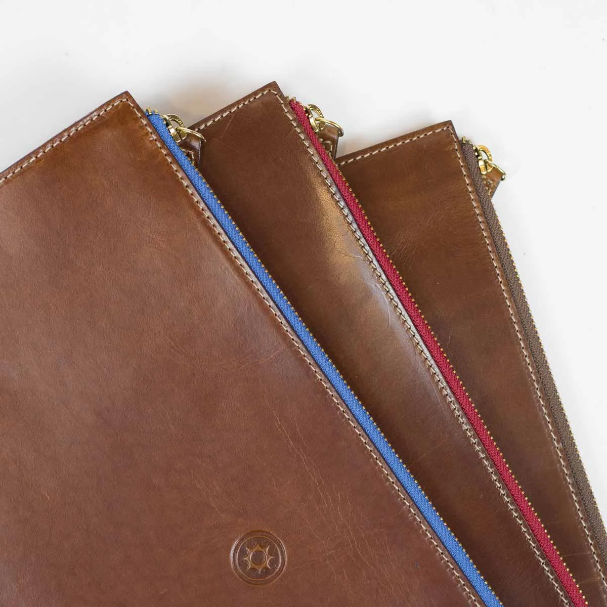 Brown leather portfolio with brown zipper