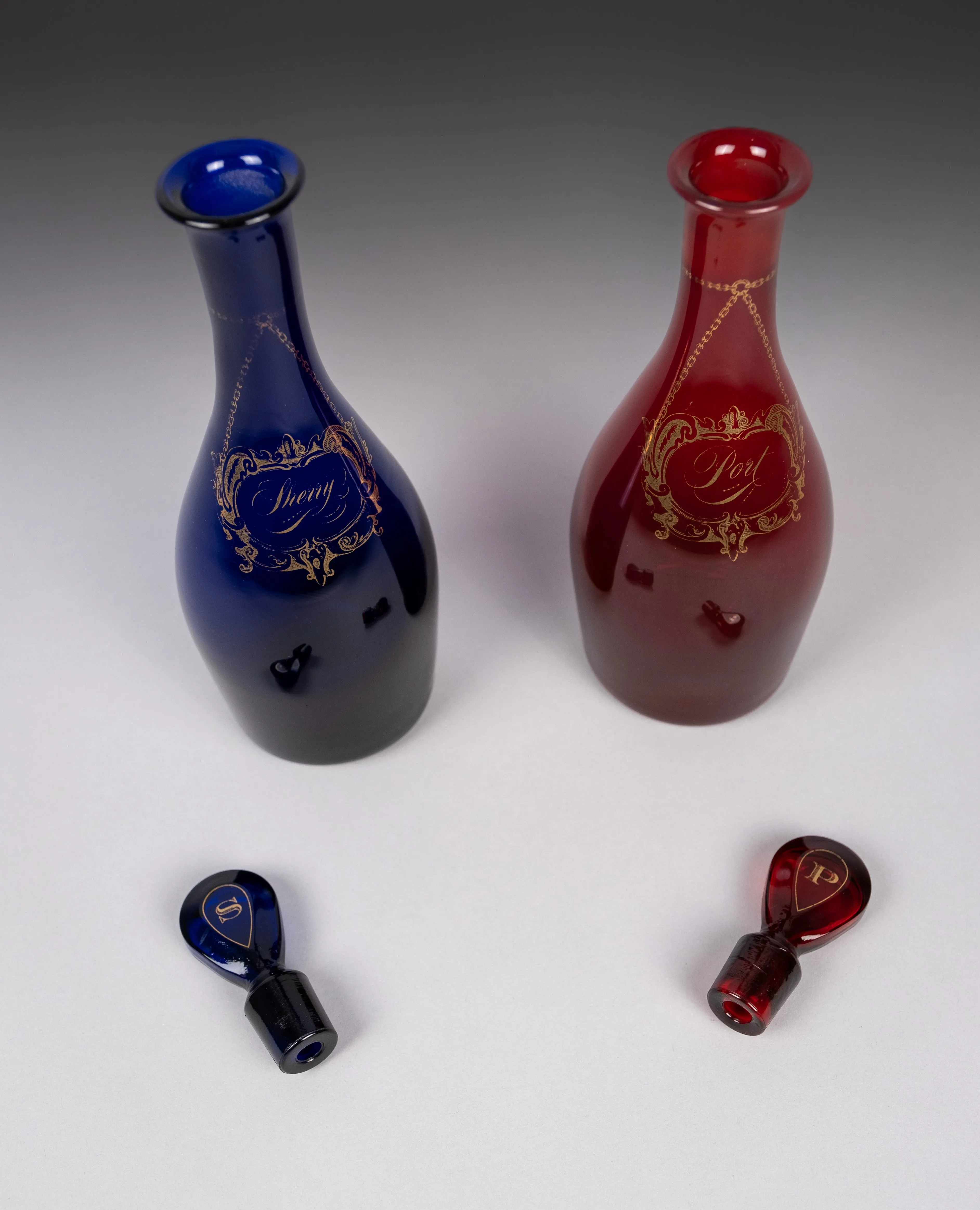 Pair Of Georgian Bristol and Ruby Glass Decanters (Sherry & Port)