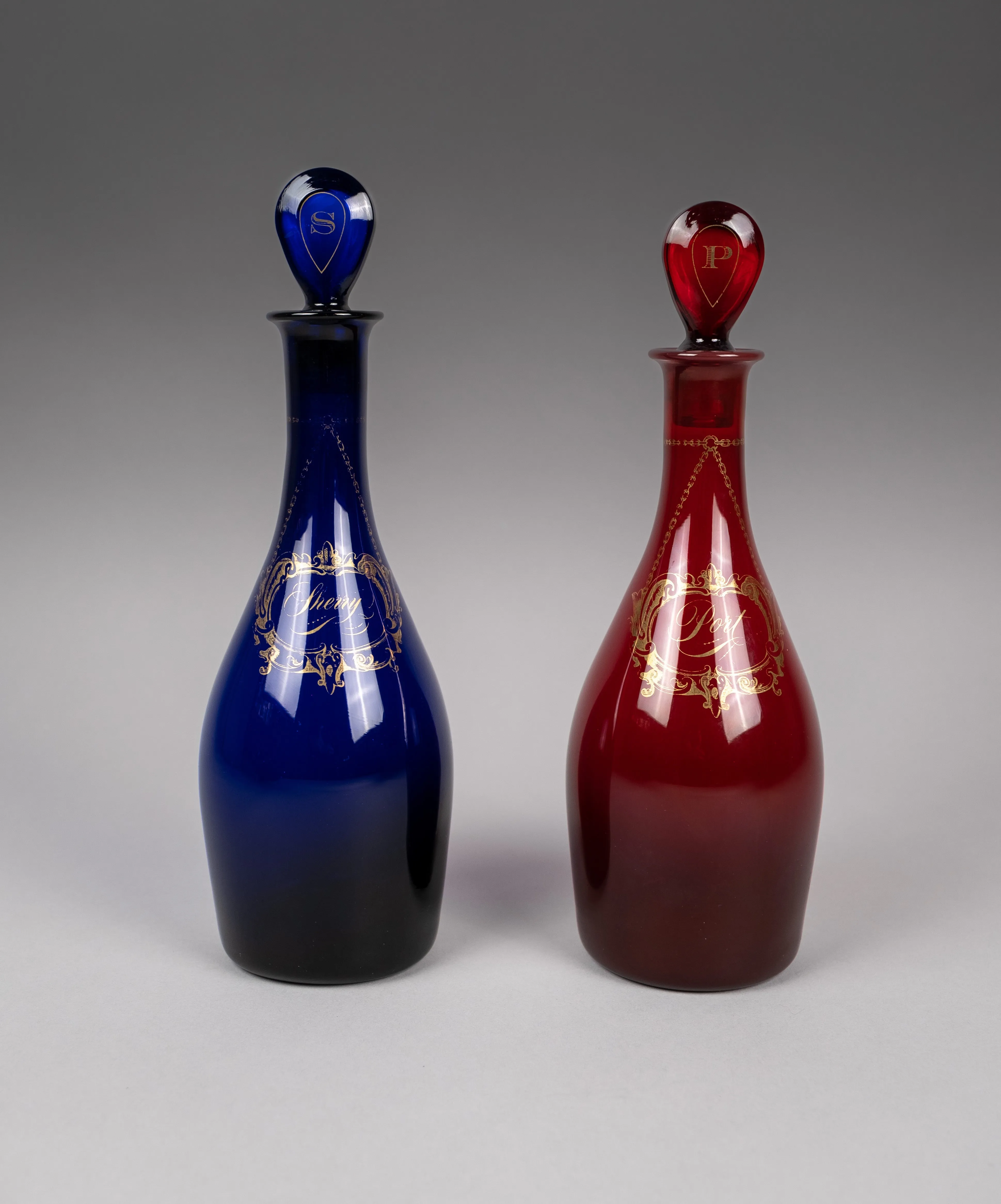 Pair Of Georgian Bristol and Ruby Glass Decanters (Sherry & Port)